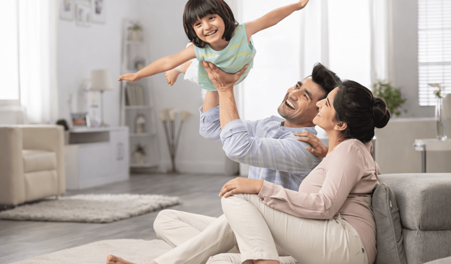 Happy family celebrating financial freedom